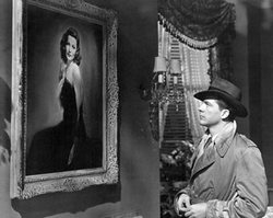 Dana Andrews gazes at the portrait of Gene Tierney as Laura (1944)