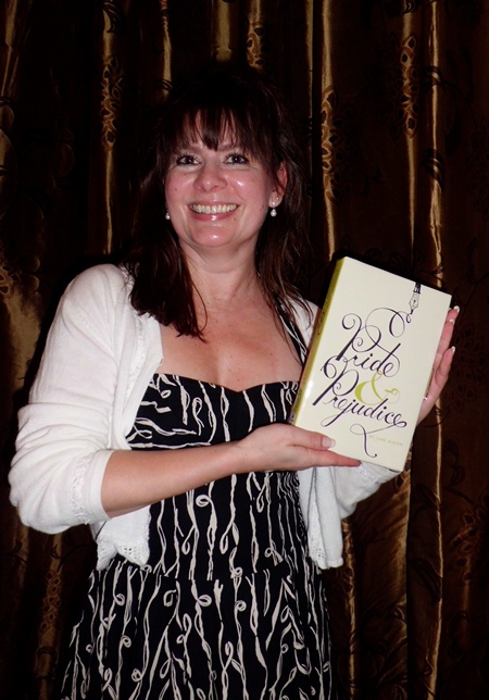 Julie A. and her Kate Spade Pride and Prejudice clutch bag