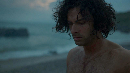 Ross (Aidan Turner) burns his shirt. Image (c) 2015 Mammoth Screen, Ltd. for Masterpiece PBS